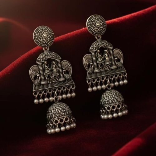 Oxidized Silver Radha-Krishna Jhumka Earrings with Pearl Accents
